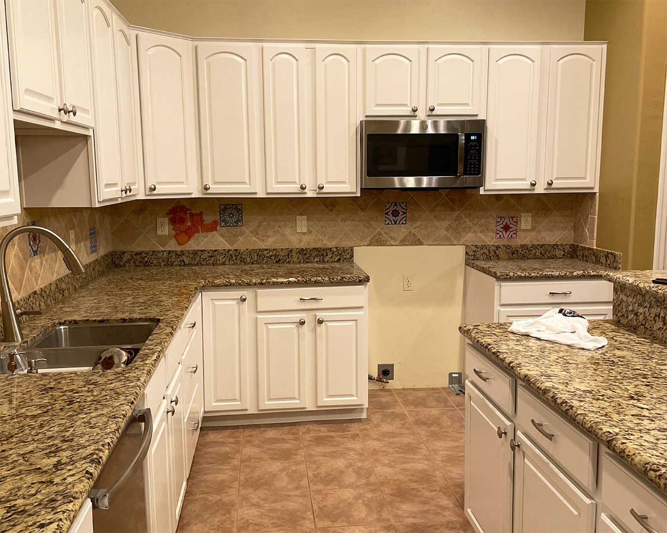 Painted white cabinets in Catalina Foothills kitchen