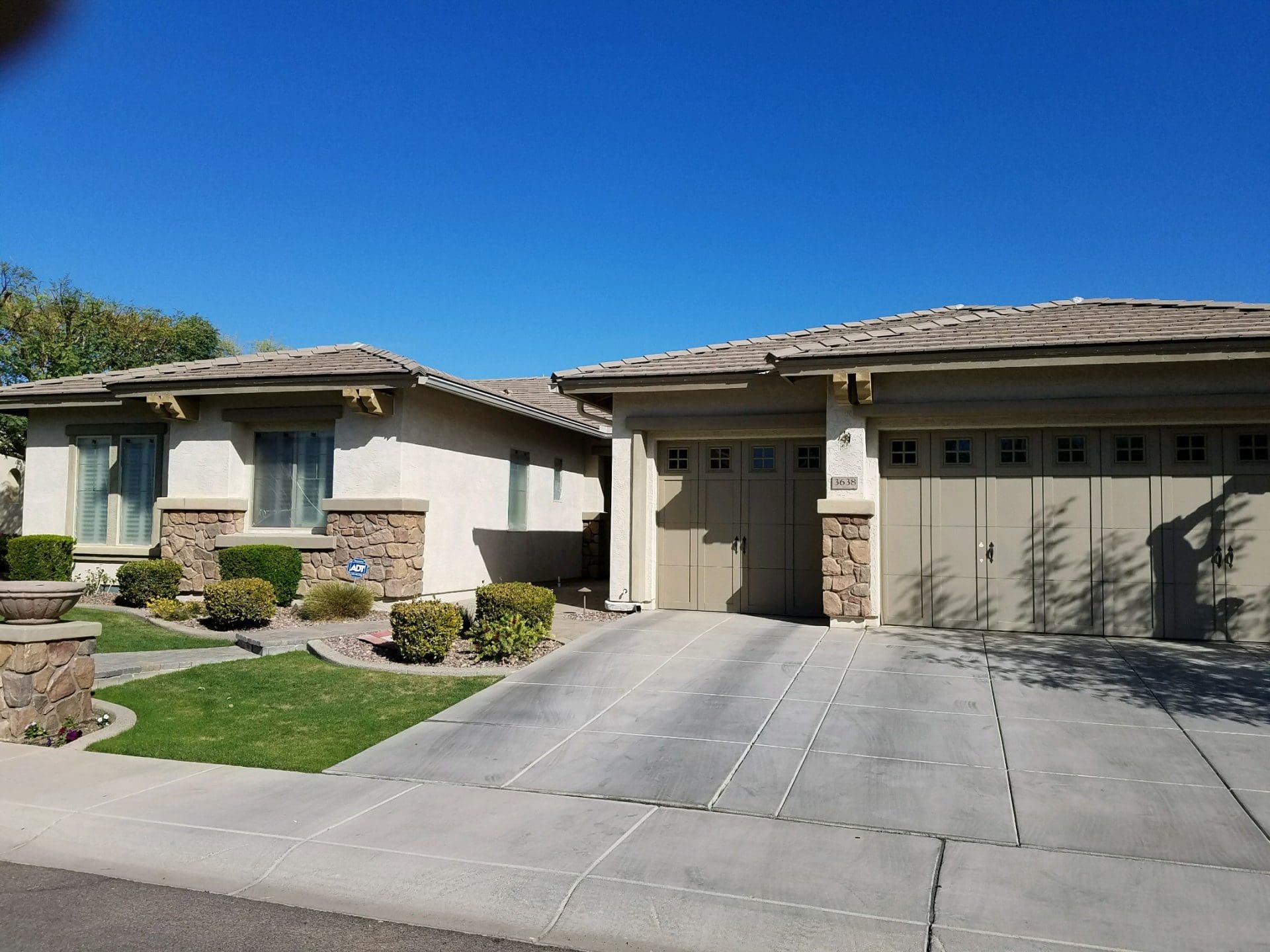 "Before" image of exterior of Arizona home