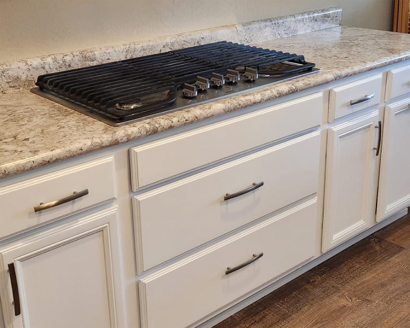 Painted white cabinets in Buckeye kitchen