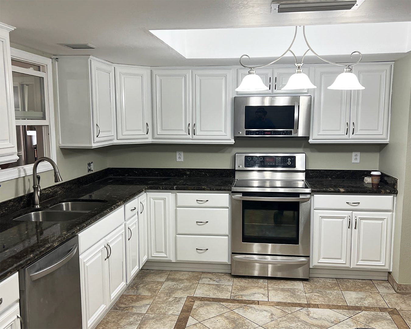 Painted white cabinets in kitchen