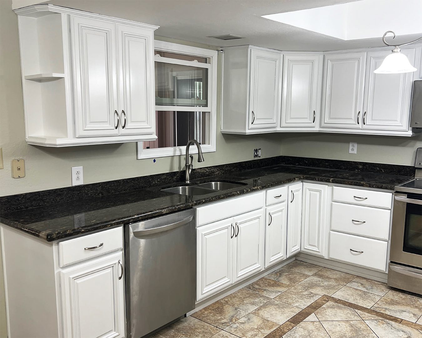 Painted white cabinets in kitchen