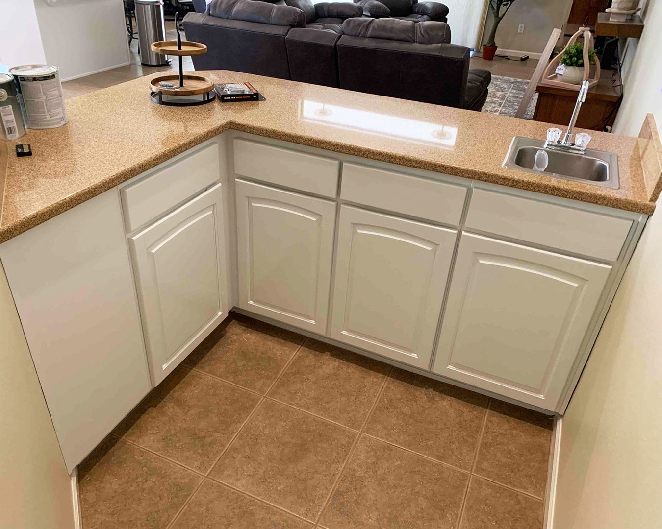 Painted white cabinets in kitchen of Goodyear home