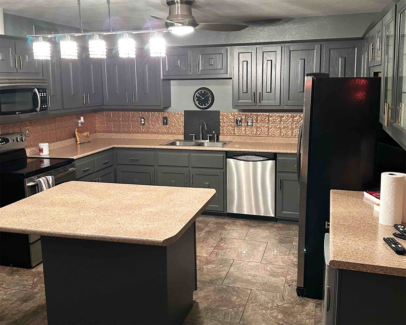 Painted grey cabinets in kitchen