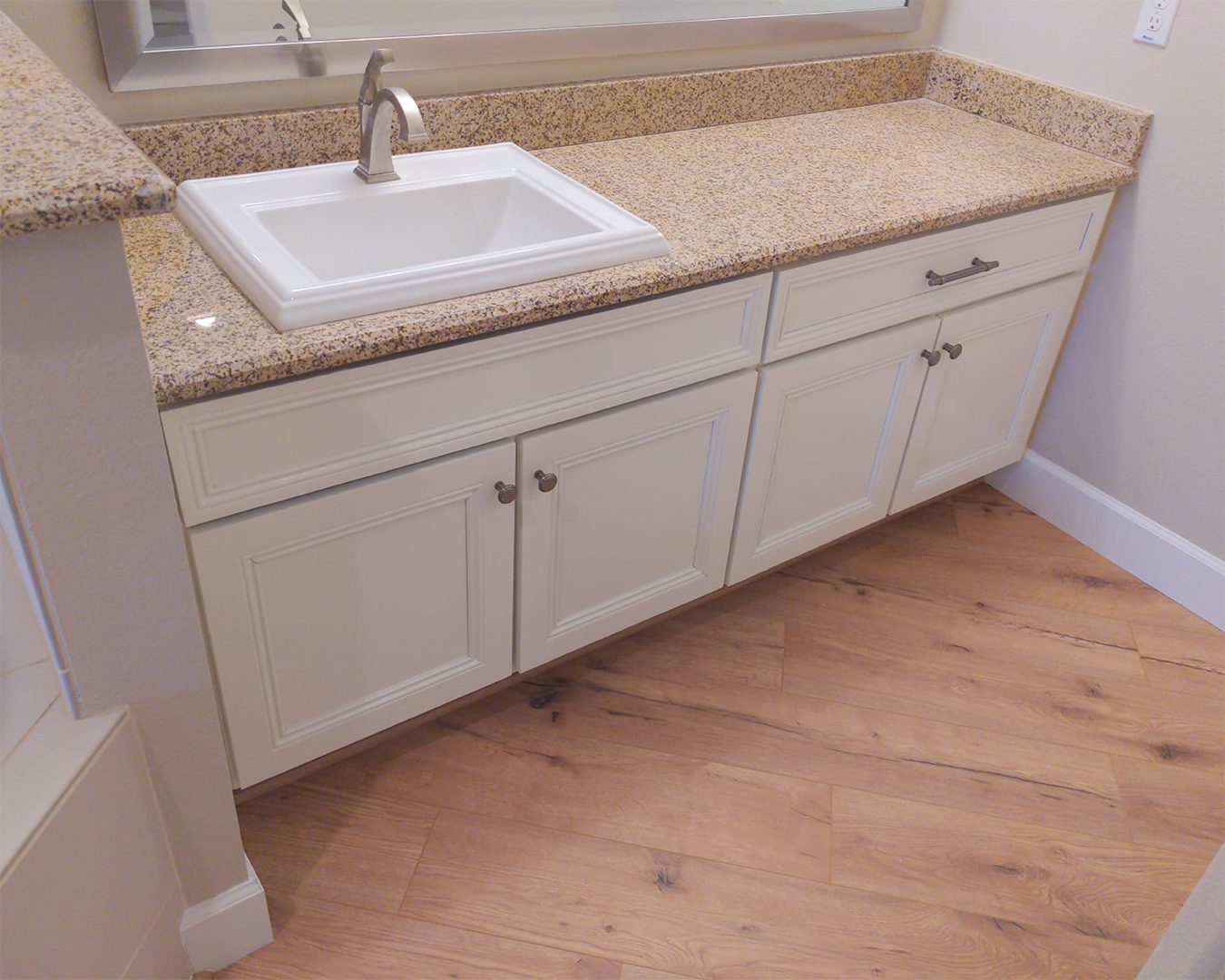 Painted white cabinets in bathroom