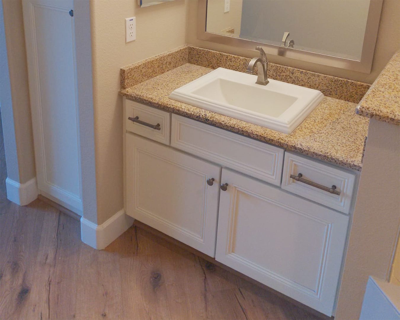 Painted white cabinets in bathroom