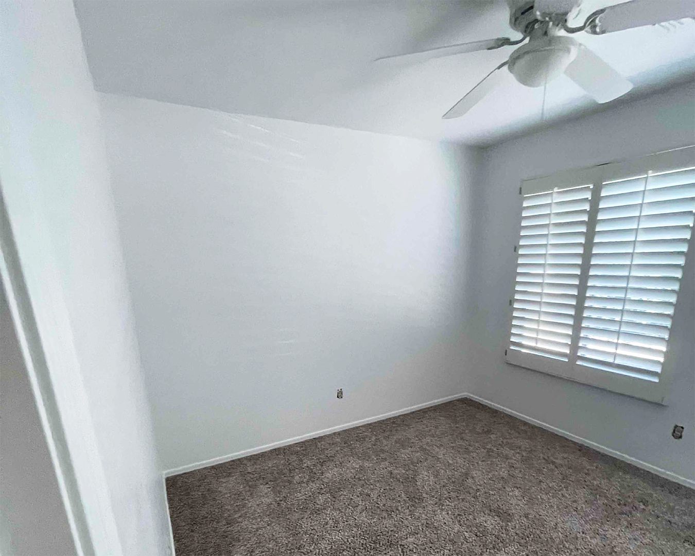 Painted white bedroom