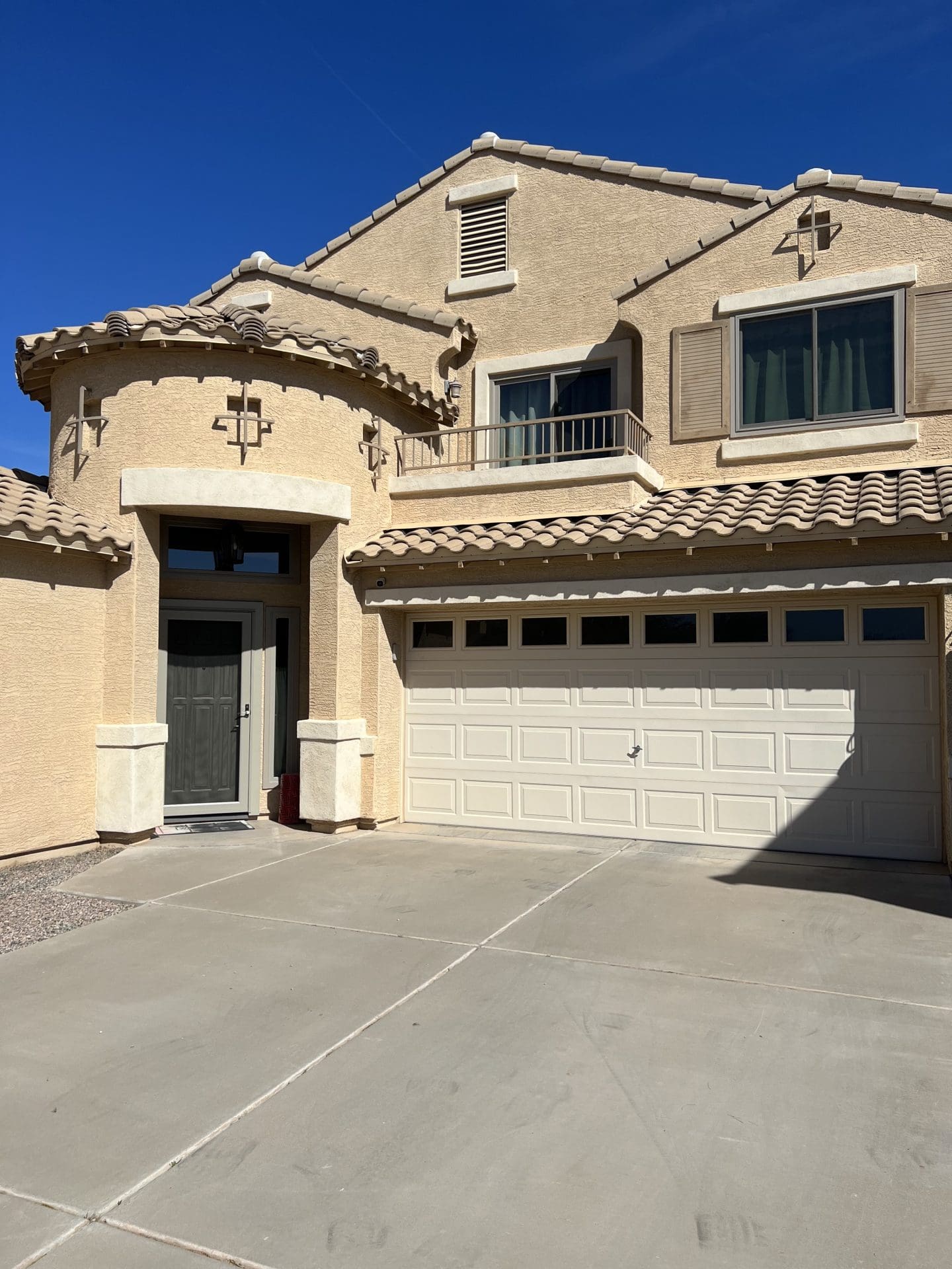 "Before" image of exterior of Arizona home