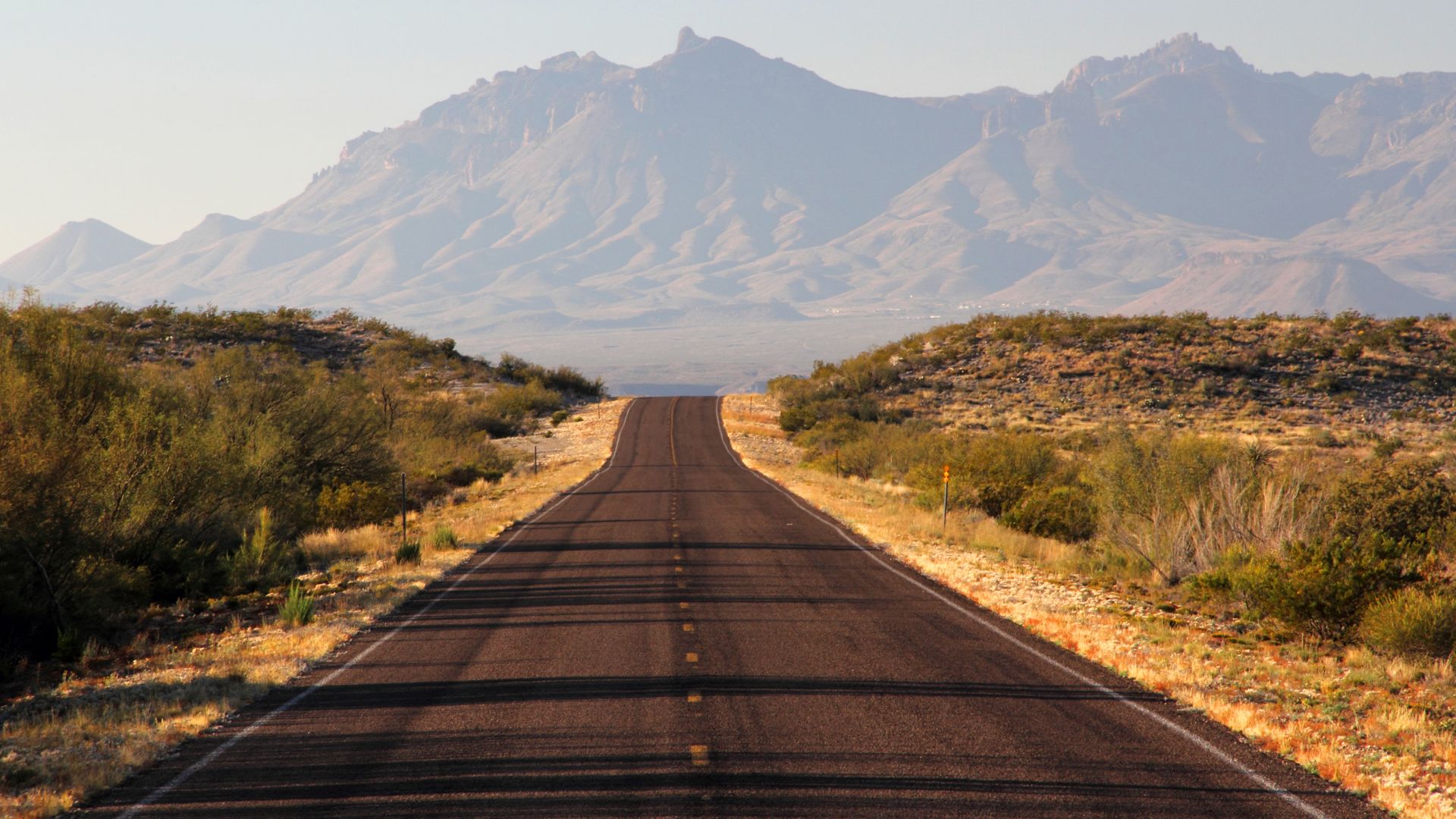 Desert drive with mountain background