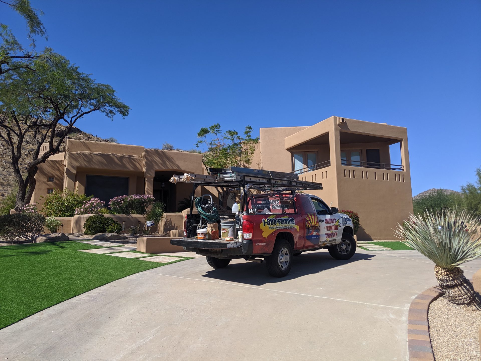 Brown home transformed by Arizona Painting Company: A beautifully painted residential exterior, showcasing a rich and inviting color, exemplifying the skillful craftsmanship and dedication of Arizona Painting Company.