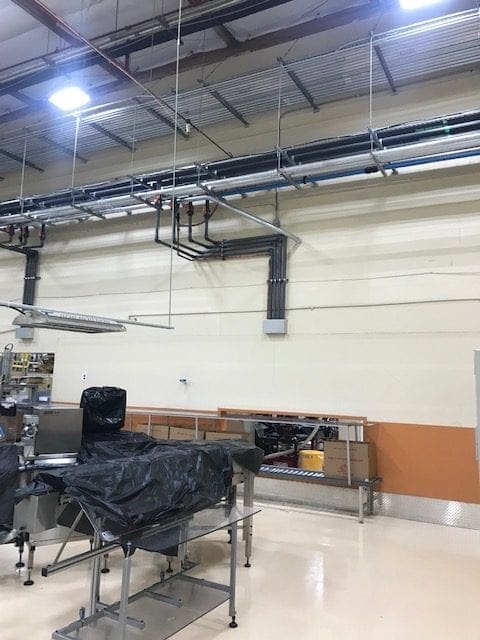 Arizona Painting Company's skilled industrial painters providing durable protective coatings for machinery and structures, enhancing both longevity and aesthetics.