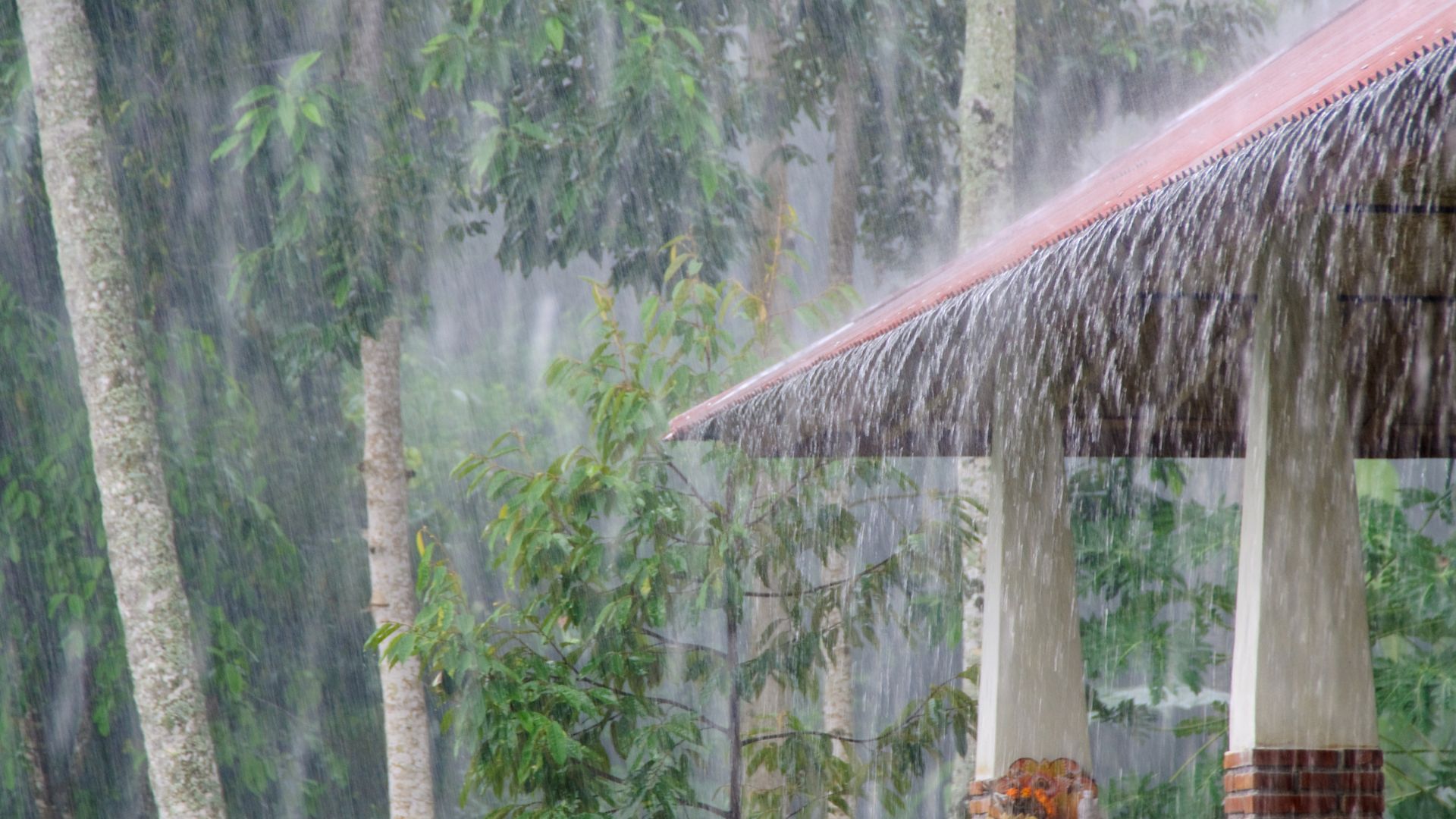 Pouring rain on a house