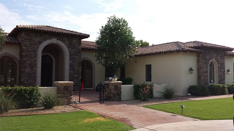 Brown painted home transformed by Arizona Painting Company: A beautifully refreshed residential exterior, exuding warmth and charm, demonstrating the exceptional workmanship of Arizona Painting Company.