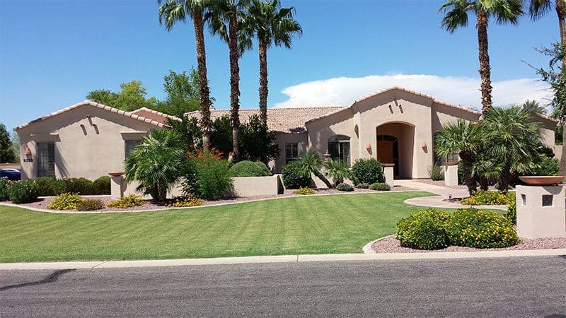 Brown painted home transformed by Arizona Painting Company: A beautifully refreshed residential exterior, exuding warmth and charm, demonstrating the exceptional workmanship of Arizona Painting Company.