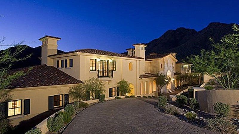 Mansion transformed by Arizona Painting Company: A freshly painted residential exterior, showcasing the expertise of Arizona Painting Company in bringing new life and elegance to this magnificent home.
