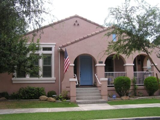 Residential exterior transformed by Arizona Painting Company: A newly painted brown home, displaying their expert craftsmanship and attention to detail.