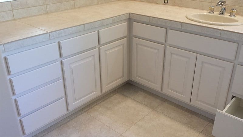 Arizona Painting Company offers Cabinet Painting: Newly painted cabinets bring a fresh and stylish transformation to any space. White Kitchen Cabinets Painted. Looks fresh and clean.