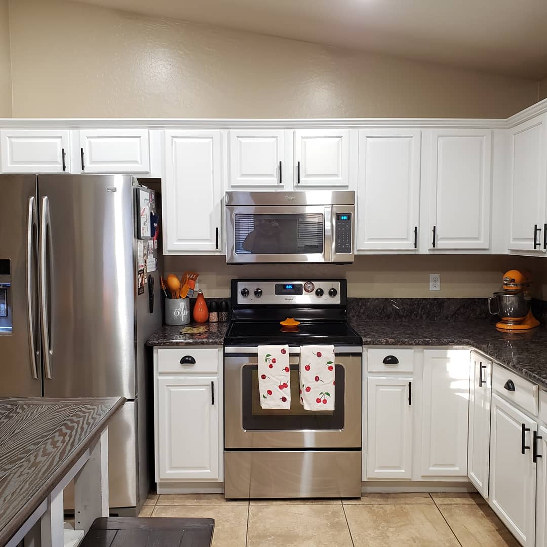Arizona Painting Company offers Cabinet Painting: Newly painted cabinets bring a fresh and stylish transformation to any space. White painted cabinets.