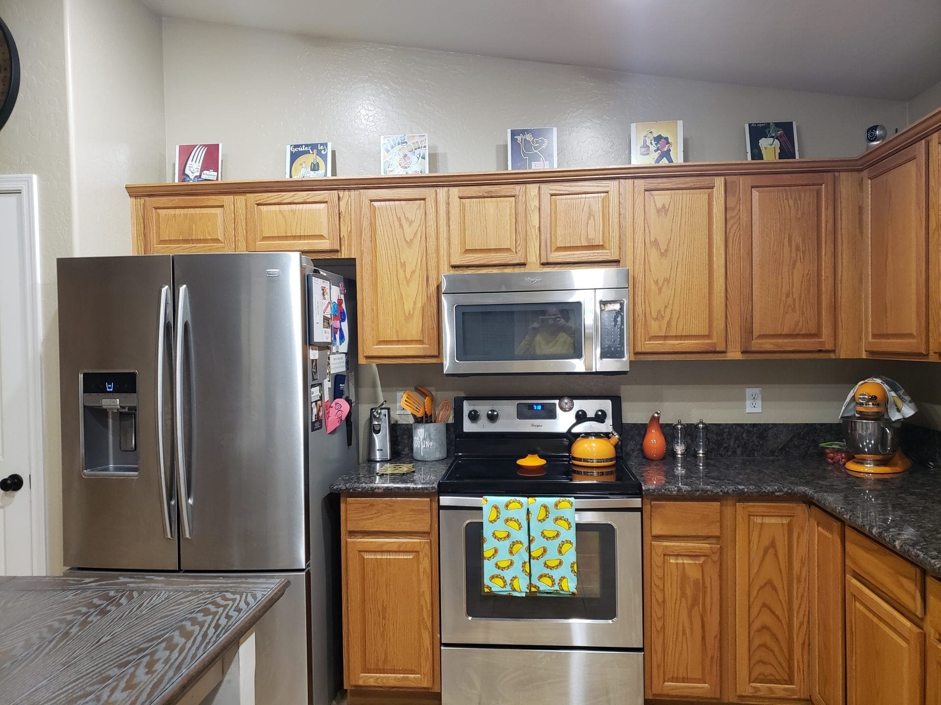Arizona Painting Company offers Cabinet Painting: Newly painted cabinets bring a fresh and stylish transformation to any space. Old brown cabinets before being painted.