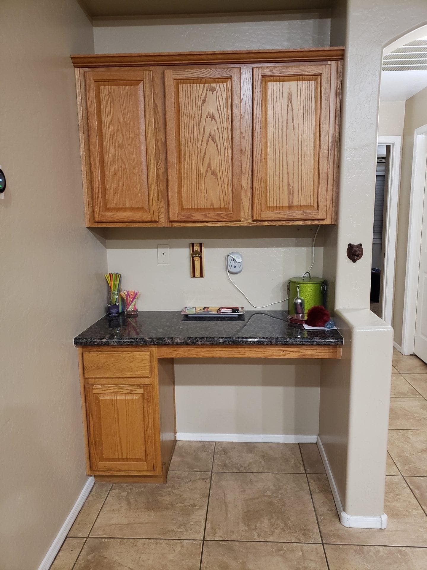 Arizona Painting Company offers Cabinet Painting: Newly painted cabinets bring a fresh and stylish transformation to any space. Old cabinets before being painted, currently brown.